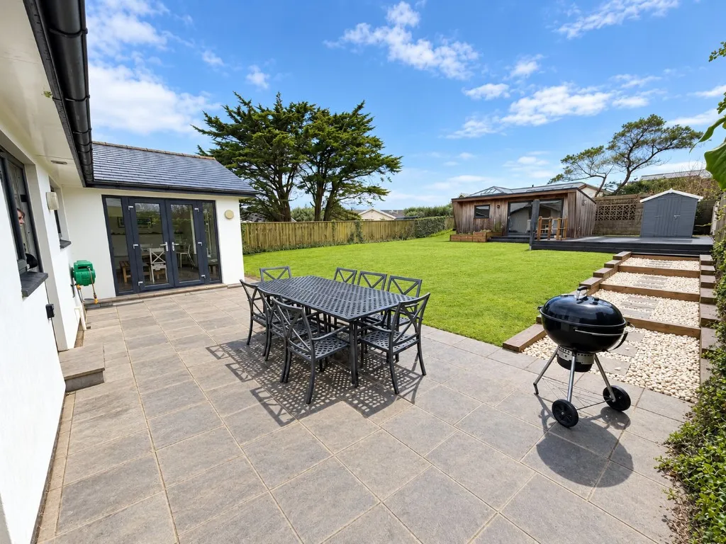 Sunny garden, patio and barbecue at 10 Tinners Way, New Polzeath