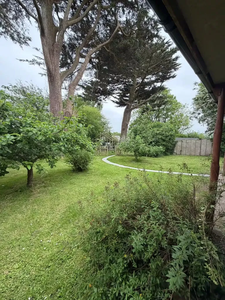 Private garden at Cedar Chalet, Chapel Amble
